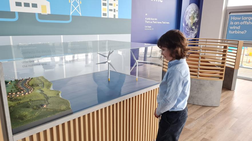 A Model showing how more turbines generate electric to light up our houses on land 